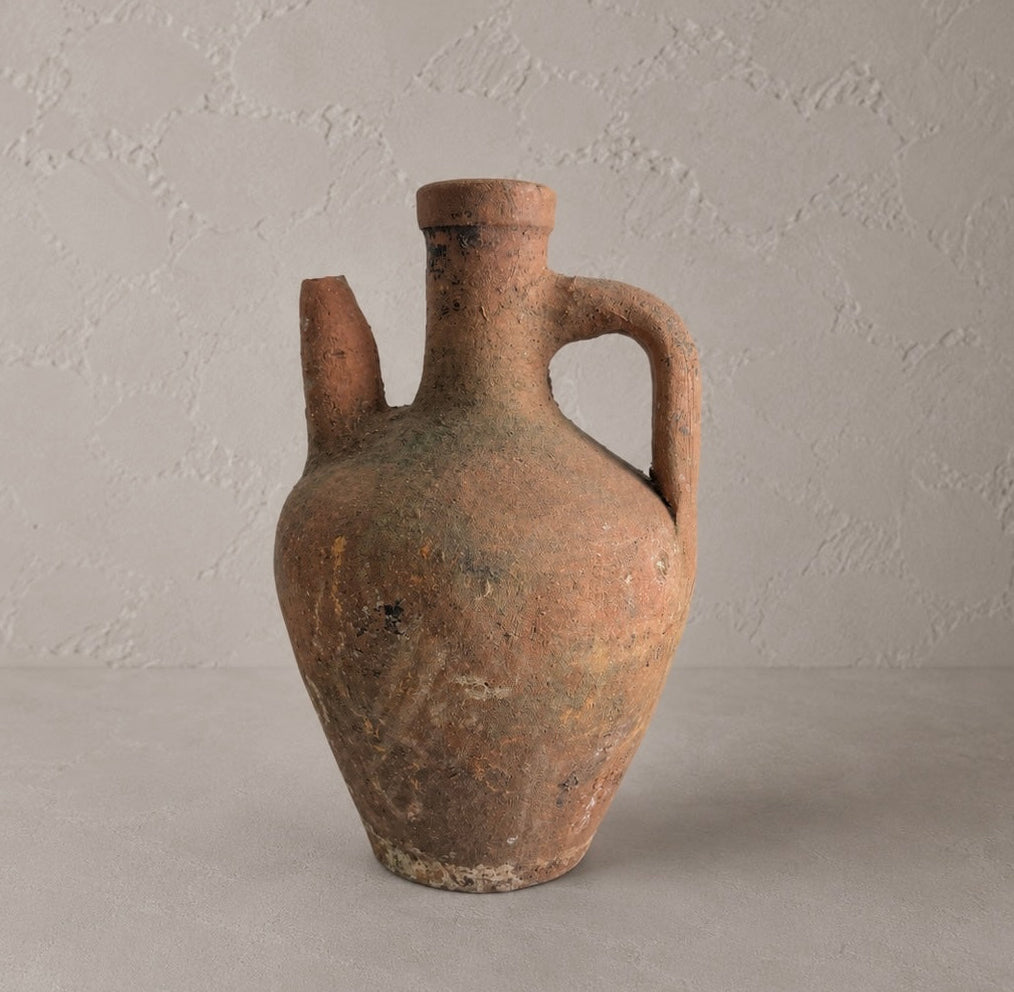 Small Vintage Amphora Vase No. III, 10-inch aged terracotta pottery vessel with single handle and timeworn brown and olive patina.
